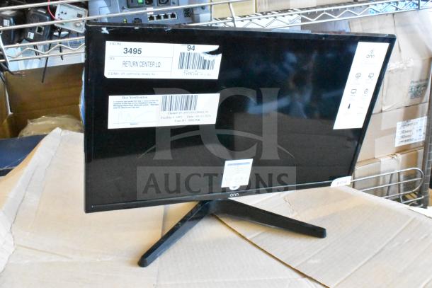 Five monitors including HP, Onn ONA18HO015 21.5", Dell E2414Ht, and IBM. Visible shipping labels indicate return status.