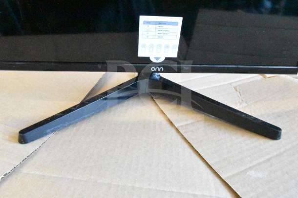 Five assorted monitors including HP, Onn ONA18HO015 21.5", Dell E2414Ht, IBM, good condition. Onn monitor display base shown.