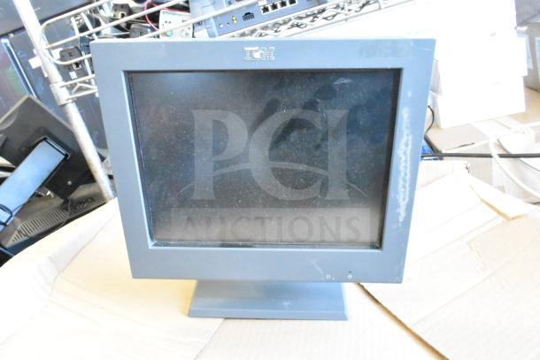 Five assorted monitors, including HP, Onn ONA18HO015 21.5", Dell E2414Ht, and IBM, displayed for auction.