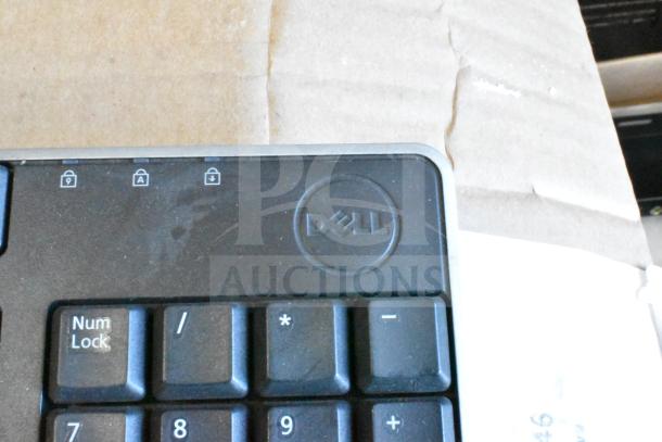 Dell keyboard, partial view, showing Num Lock key and lock icons. Keyboard is part of a lot of 40.
