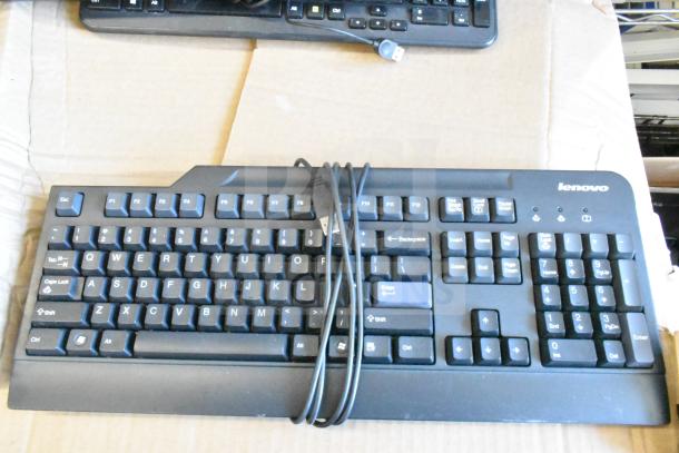 40 Lenovo USB keyboards, wired, black, full-size, standard layout, gently used.