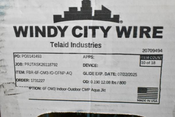 Box label from Windy City Wire, details include PO: PO0141493, ITEM: FBR-6F-OM3-IO-OFNP-AQ, made in USA.
