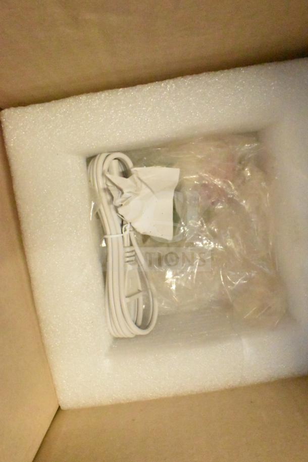 Nine assorted electronic items including cables, packed in foam-lined box. Items feature CCTV dome camera and Dell computer tower.