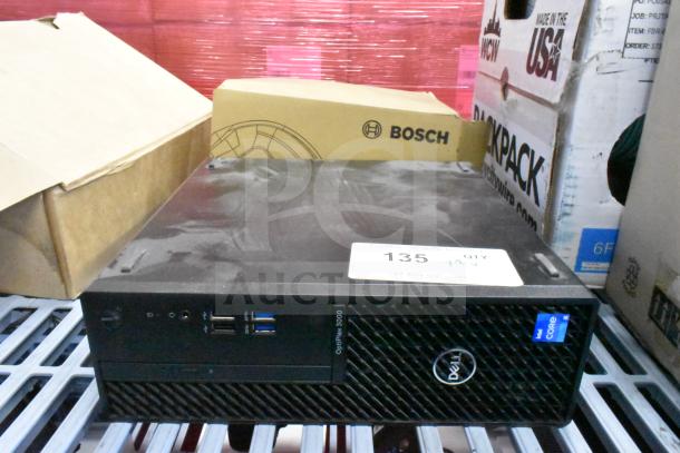 Dell OptiPlex 3000 computer tower with Intel Core label. Includes Bosch box. Auction lot of 9 items.