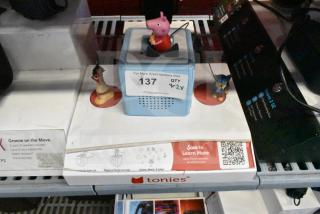 Tonie Box display with Moana, Paw Patrol, Peppa Pig characters, and RecoveryTherm Cube. Item label "137, QTY x2."