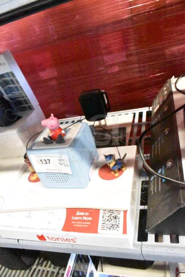 Tonie Box display with Moana, Paw Patrol, Peppa Pig Tonies. Includes RecoveryTherm Cube. Good condition, lot of 2.