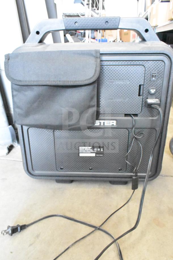 Monster MNVISION156-C 15.6" speaker, rugged design with carrying handle, visible cords, 100-240V, 1 phase.