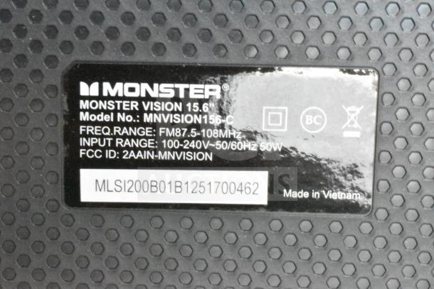 Monster MNVISION156-C Visioni 15.6" Speaker label, showing model details, frequency range, input range, and FCC ID.