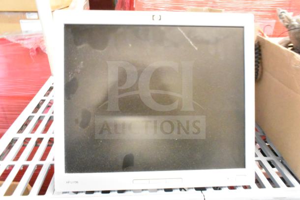 HP L1706 monitor, used condition, visible wear on screen. Part of a lot with 25 items, including Samsung and Dell monitors.