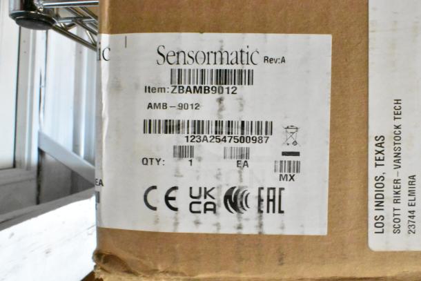 Sensormatic ZBAMB9012 Label Deactivator Antenna box with label showing item info and barcodes for auction.