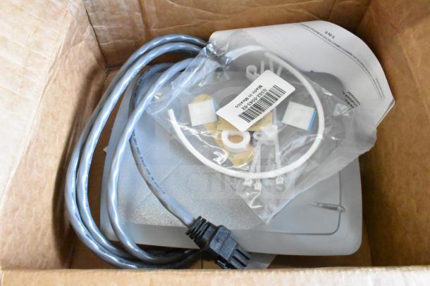 Sensormatic ZBAMB9012 Label Deactivator Antenna and ZBSMPCPEF CompactPad Pro EAS Deactivator Pad in box, with cables and accessories.