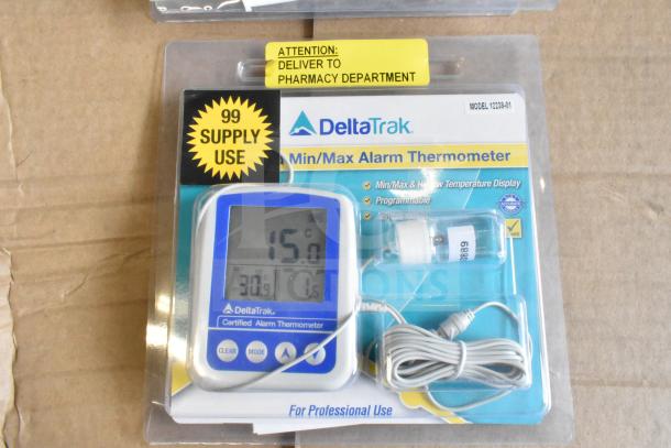DeltaTrak Min/Max Alarm Thermometer, model 12238-01, new in packaging. Display reads 15°C, includes probe and cable.