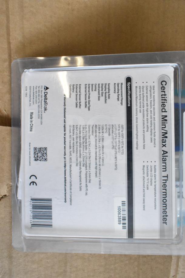 3 new DeltaTrak Min/Max Alarm Thermometer packages, specifications listed, barcode 700739122581, made in China.