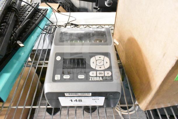 Zebra ZD620 thermal barcode printer, used condition, with visible control buttons and display. Model label present.
