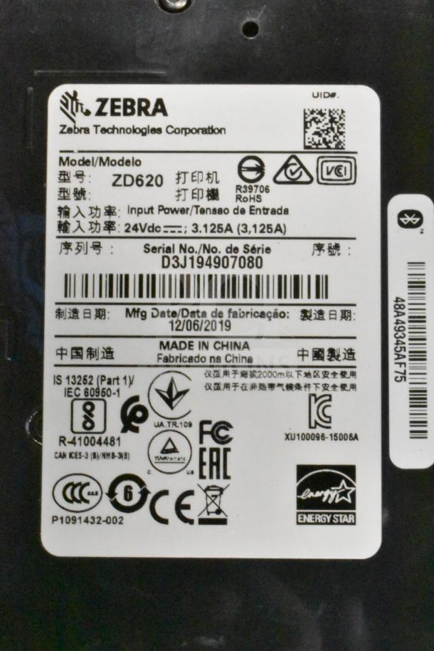 Zebra ZD620 Thermal Barcode Printer label showing model, serial number D3J194907080, and manufacturing date 12/06/2019.