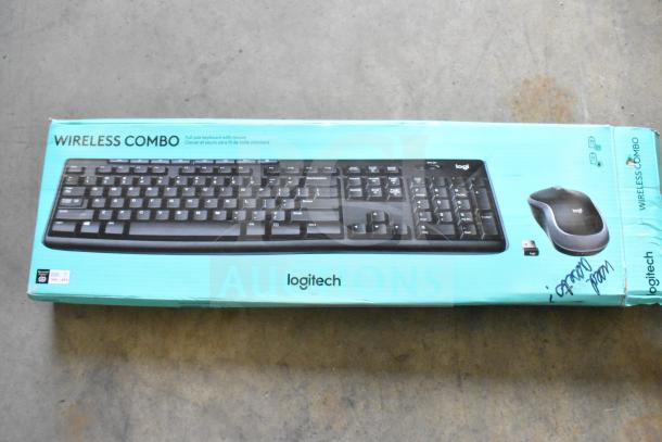 Logitech Wireless Combo keyboard and mouse, new in box, labeled "Wireless Combo." Box shows slight wear, Logitech logo visible.