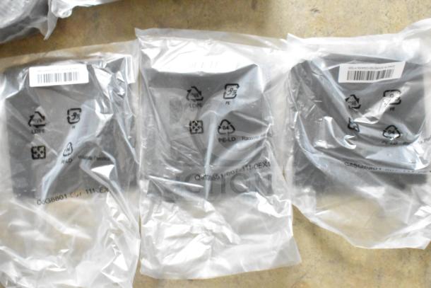 Assorted lot of various cables in sealed plastic packaging. Labels show recycling symbols and barcodes. Items in new condition.