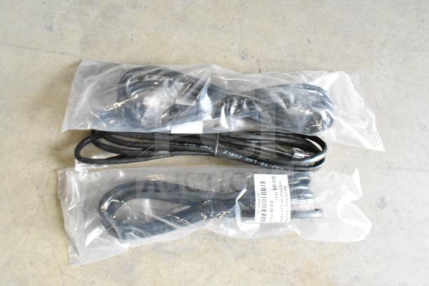 Lot of assorted cables sealed in plastic bags, various lengths and types, visible labels with specifications and origin.