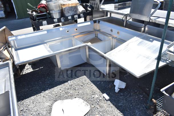 "Brand new Regency 600S3242424C L-shaped 3-bay sink with dual drain boards, no legs, scratch and dent condition."