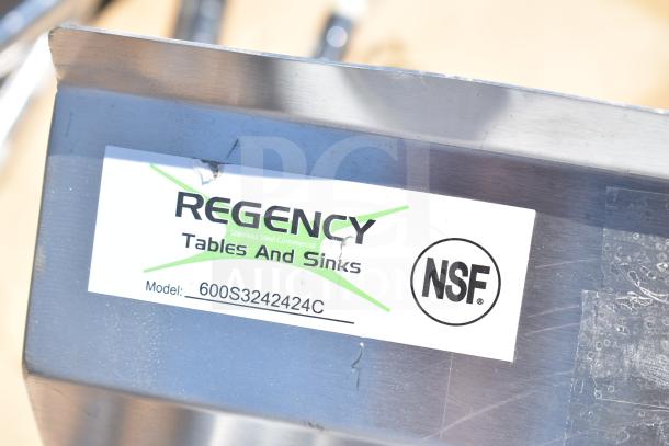 Brand new Regency 600S3242424C L-shaped 3-bay sink with dual drain boards, stainless steel, NSF certified, scratch and dent condition, no legs.