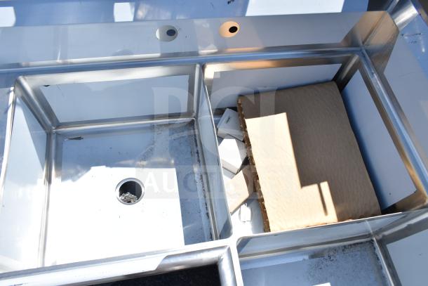 BRAND NEW Regency 600S3242424C L-shaped 3-bay sink, dual drain boards, scratch and dent, no legs, stainless steel.