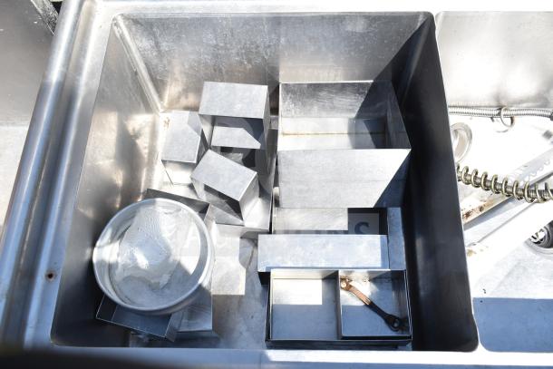 TSB-3-R2 Commercial 3 Bay Sink with right side drain boards, missing legs. Features durable stainless steel construction.