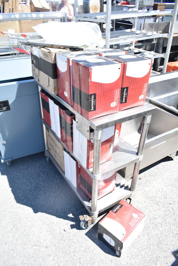 17 items including Berevino stemless wine glasses in boxes on metal 3-tier cart, ready for auction.