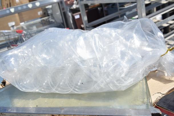 Clear plastic bag containing Berevino stemless wine glasses, bundled together, showcasing product transparency and quantity.