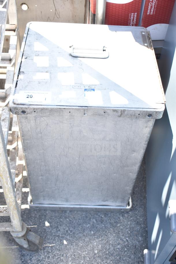 CresCor metal catering case, sturdy design with a handle, showing signs of wear. Model and auction tag visible.