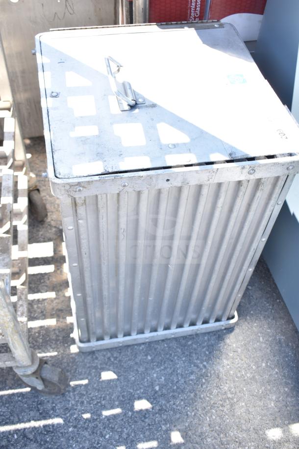 CresCor metal catering case, silver finish, visible handle on top, ribbed sides, lightly worn condition.