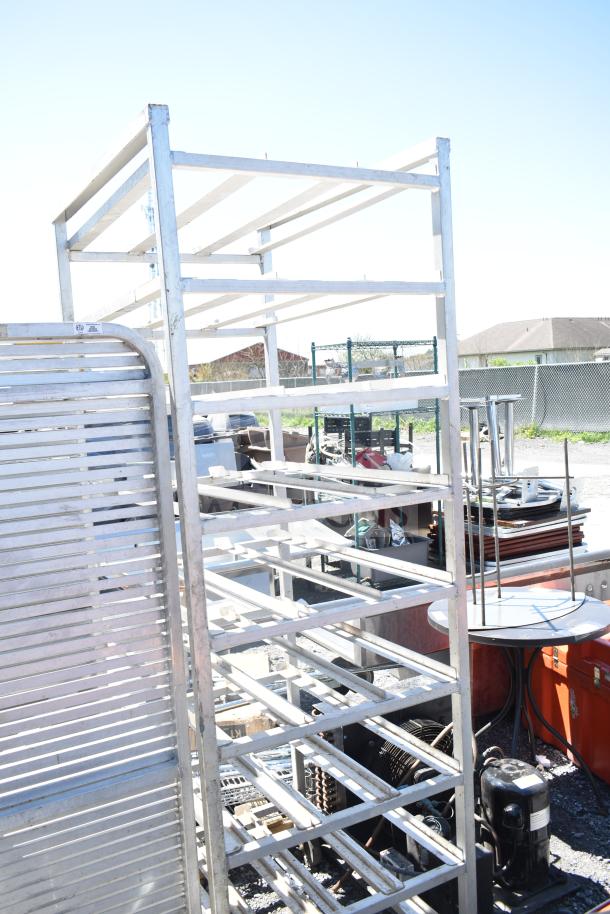 Two various metal pans mounted on commercial casters. Sturdy construction, ideal for industrial use. Good condition.