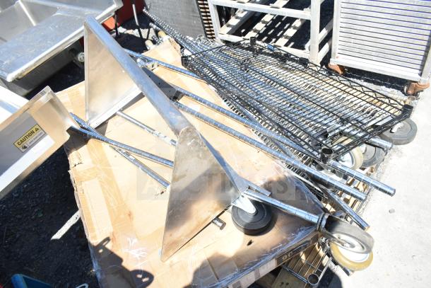 Three-item set with wire shelf, metal poles, and wall mount shelf on a cardboard surface. Includes a caution label.