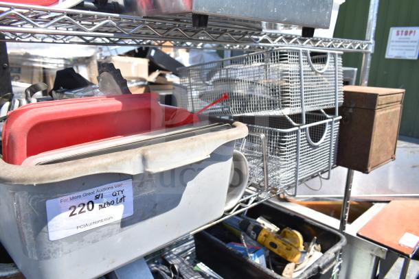 Chrome finish 5-tier wire shelving unit on casters, includes poly bins, bus bins, cooler racks; buyer must dismantle.