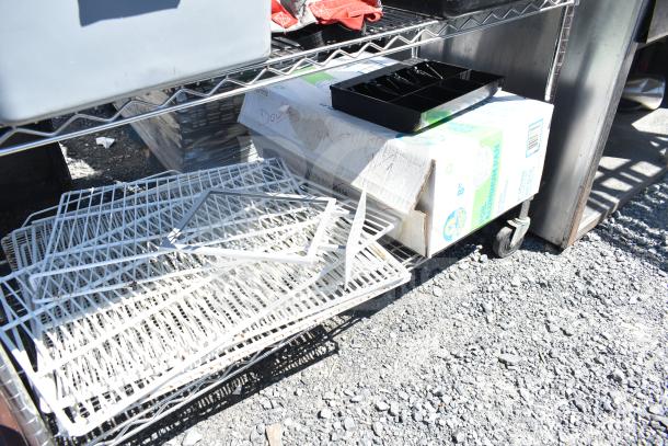 Chrome finish 5-tier wire shelving unit with commercial casters, includes poly bins, bus bins, cooler racks. Buyer must dismantle.