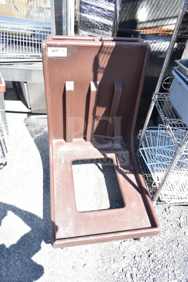 Brown poly dish caddy dolly with commercial casters, label showing "221" and "Qty 1", used condition.