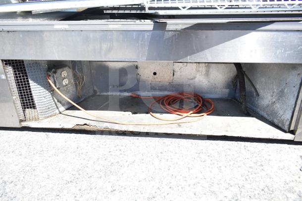 Leader MCB77 deli display case, commercial floor style, 115 volts, 1 phase, visible wear, includes wiring and fan.