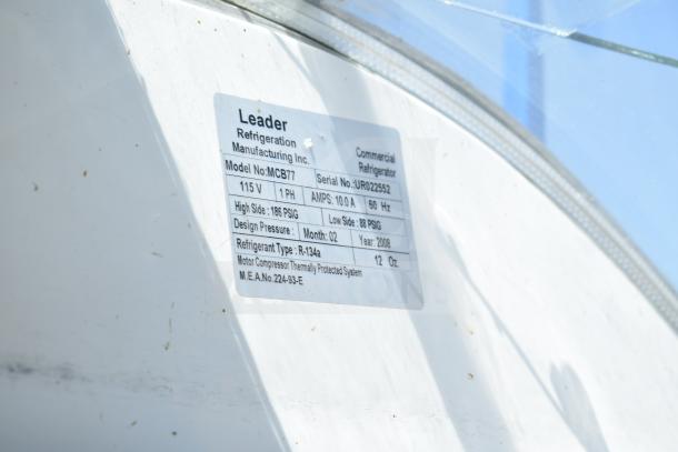 Leader MCB77 commercial deli display case, 115V, 1 Phase, visible label showing model and specs.