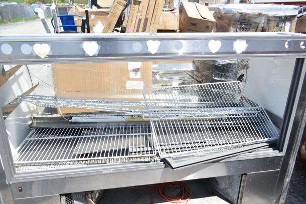 Leader MCB77 deli display case, 115V, 1 phase. Commercial floor style, glass front, metal racks, fair condition.