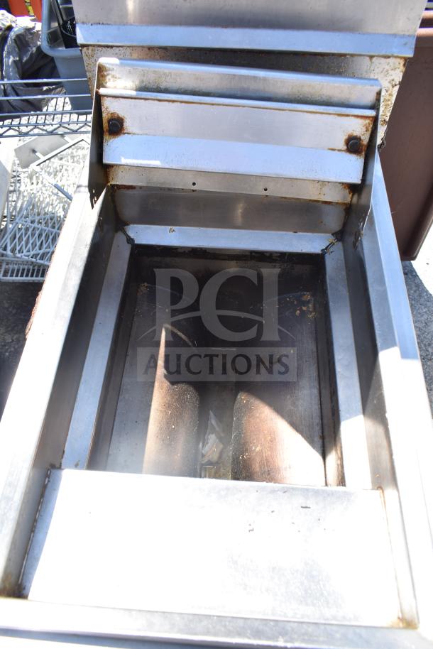 Frymaster J2XLRSP commercial natural gas fryer, floor style, used condition, stainless steel finish, visible wear.