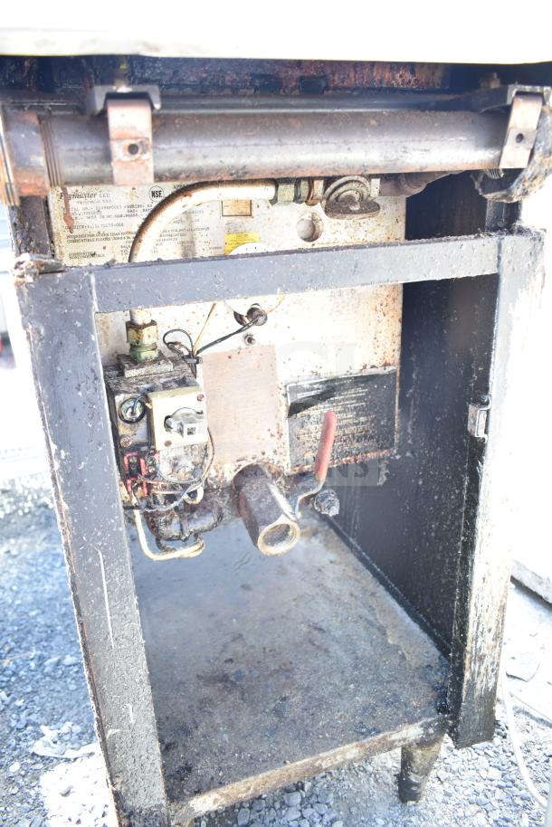 Frymaster J2XLRSP commercial deep fat fryer, natural gas powered, showing interior components, signs of use visible.