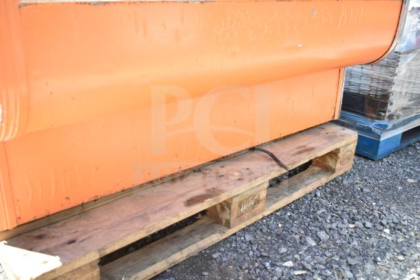 Leader CVK48 S/C deli display case on pallet. Orange exterior. 115 volts, 1 phase. Used condition.