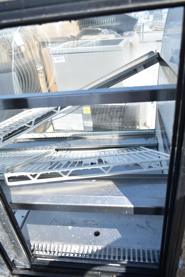 Leader CVK48 S/C commercial deli display case, 115V, 1 phase. Features wire shelving and glass front. Used condition.