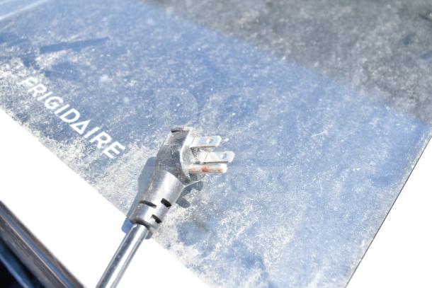 Four mini coolers, including Frigidaire model shown. Visible wear, 115V, 1 phase. Includes Arctic Air, Accucold.