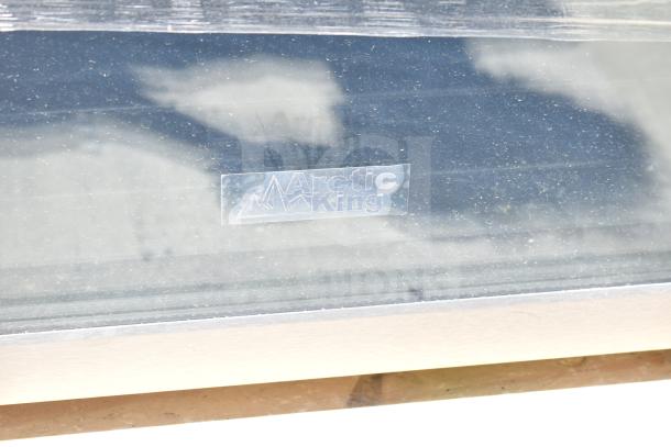 4 mini coolers including Frigidaire, Arctic Air, and Accucold, 115V, 1 phase. Visible Arctic King label, slightly dusty.