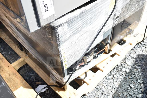 Four mini coolers including Frigidaire, Arctic Air, and Accucold, wrapped in plastic on a pallet. 115 volts, 1 phase.