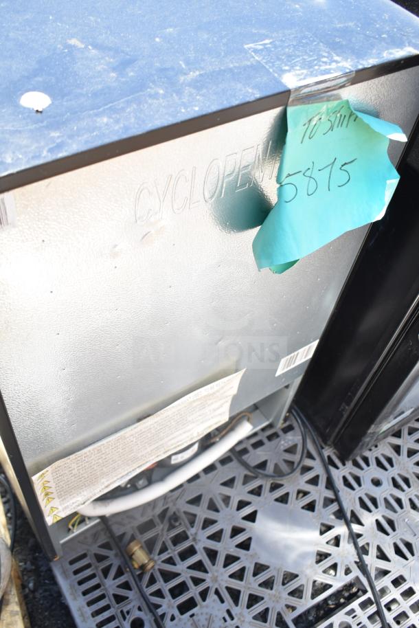 Two mini coolers, 115 volts, 1 phase, marked "Cyclopentane". Includes label with specifications and blue note attached.