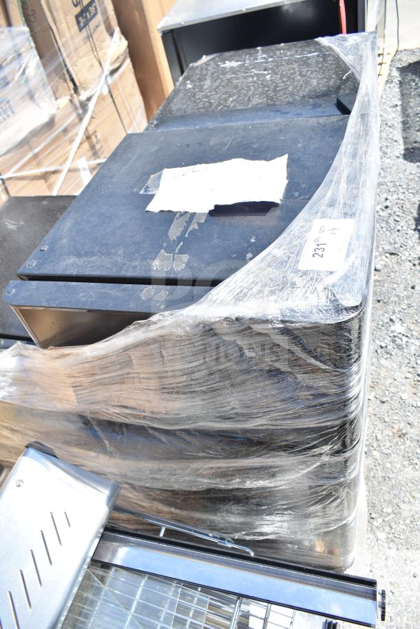 Four mini coolers including Black & Decker, EdgeStar wrapped in plastic. 115 volts, 1 phase. Auction lot of 4.