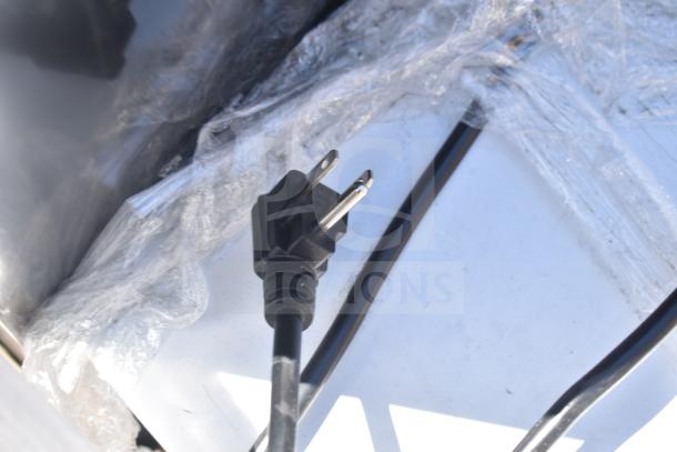 Plastic-wrapped power cord for mini coolers, voltage label unclear. Includes Black & Decker, EdgeStar models. 115 volts.