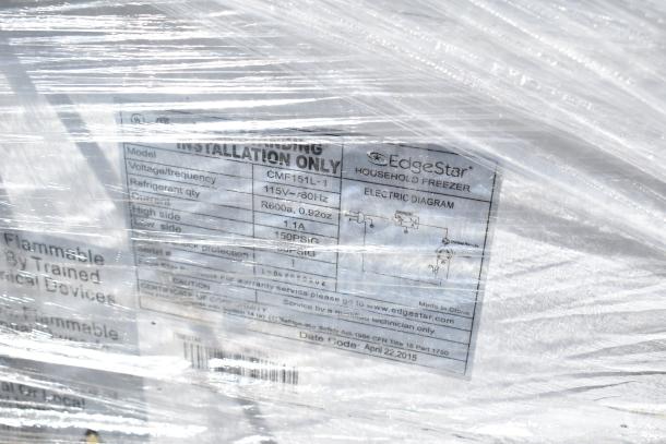 Four mini coolers, including Black & Decker, EdgeStar model CMF151L-1, 115 volts, 1 phase, wrapped in plastic.