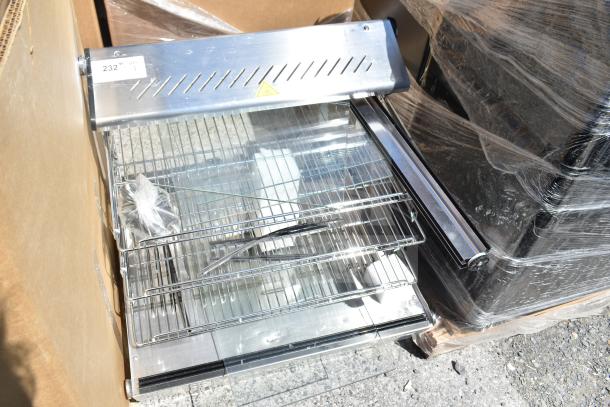 Brand new ServIt 423HDM26SA 26" heated display case, 3 shelves, sliding doors, 120V, scratch and dent condition.